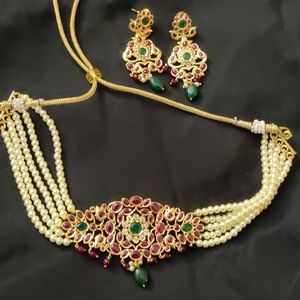 Brand new pearl choker set with rubies and emerald